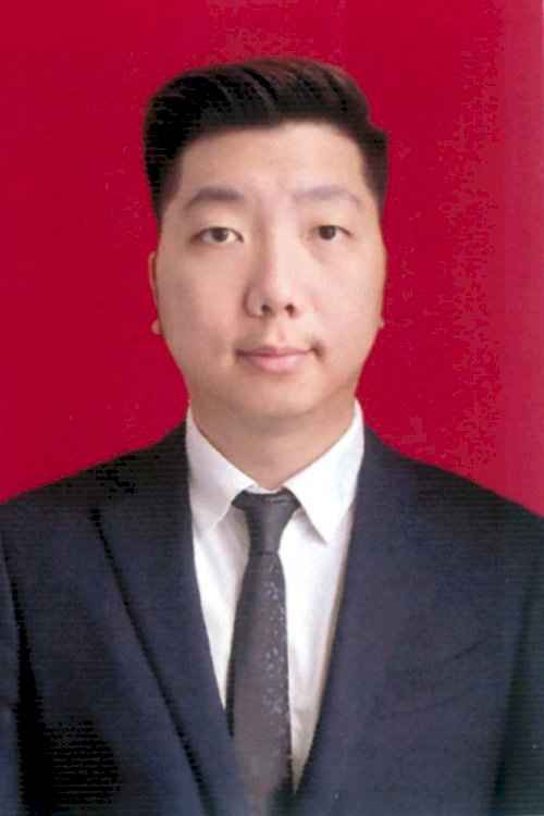 RICKY TAN