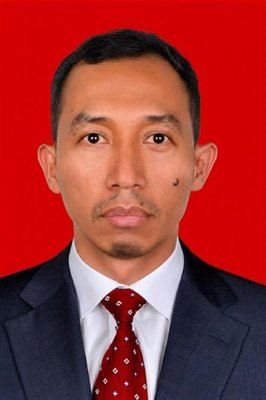 YUSTINUS SUHARTONO